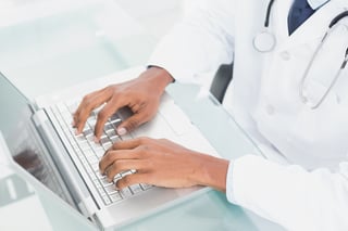 Physician using a laptop