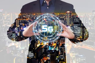 Businessman presenting 5G icon
