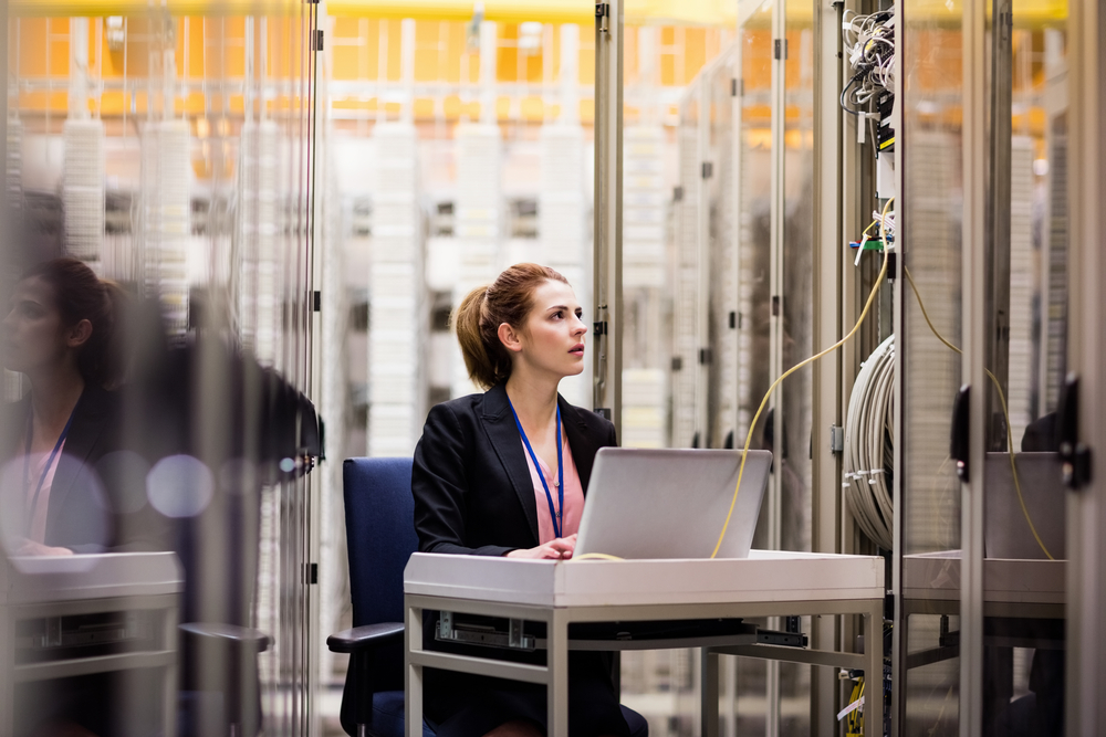 Technician working in server room
